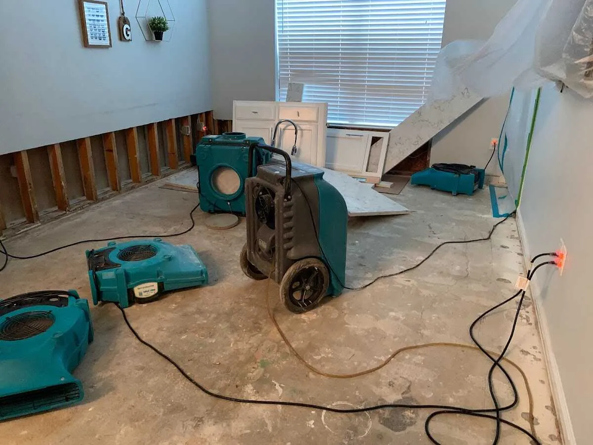 Dehumidifier in flood-cut room for Water Damage Restoration in Moberly